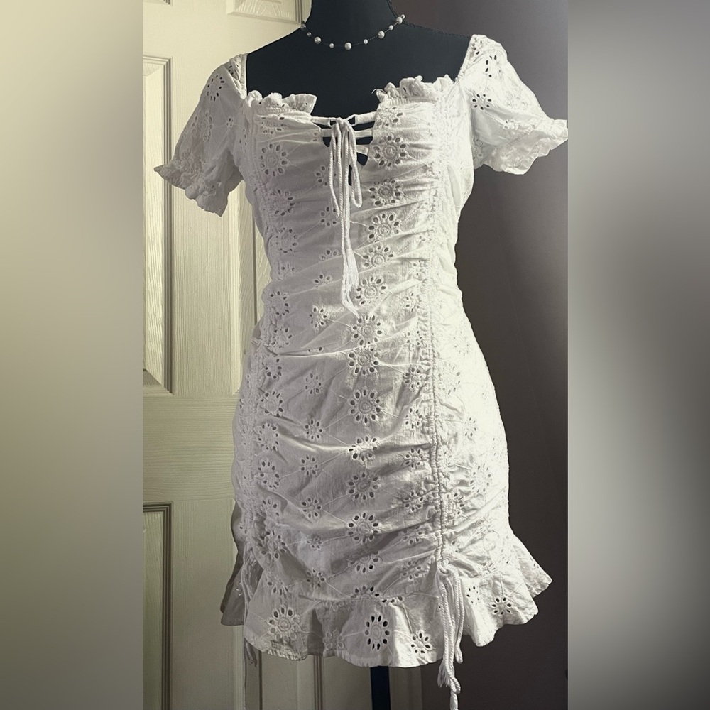 White Eyelet Lace-Up Mini Dress with Ruffle Hem